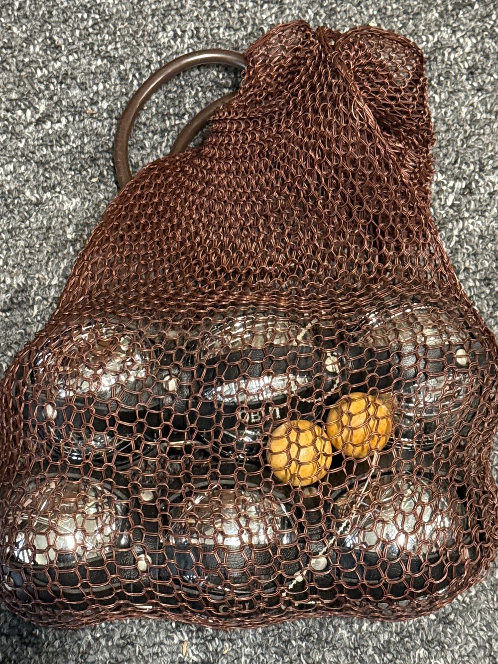Lot 41: A Set of Obut Metal Petanque Boules and Jacks