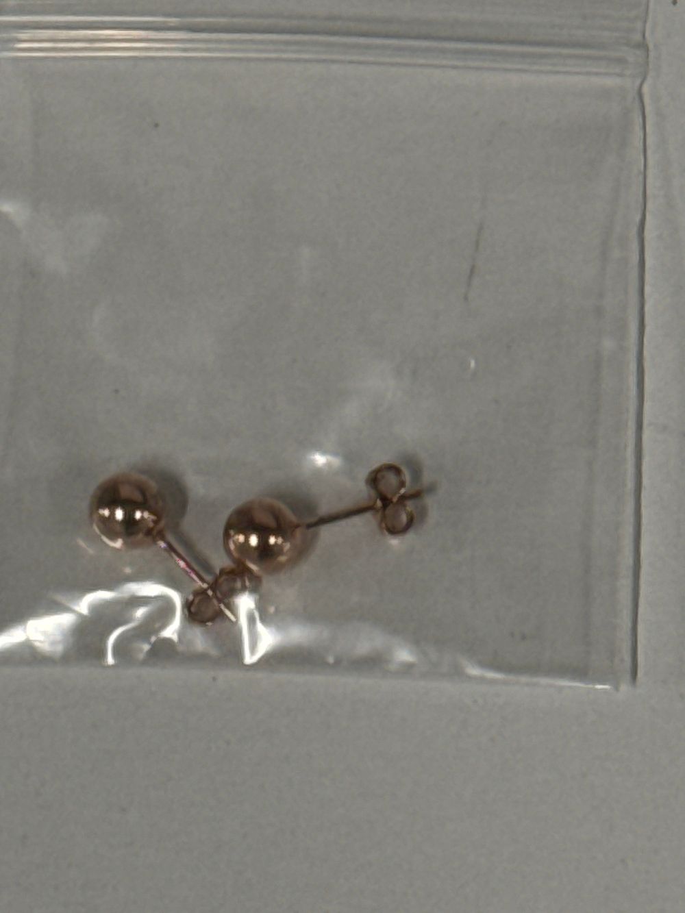 Lot 62: A pair of sterling silver ball stud earrings