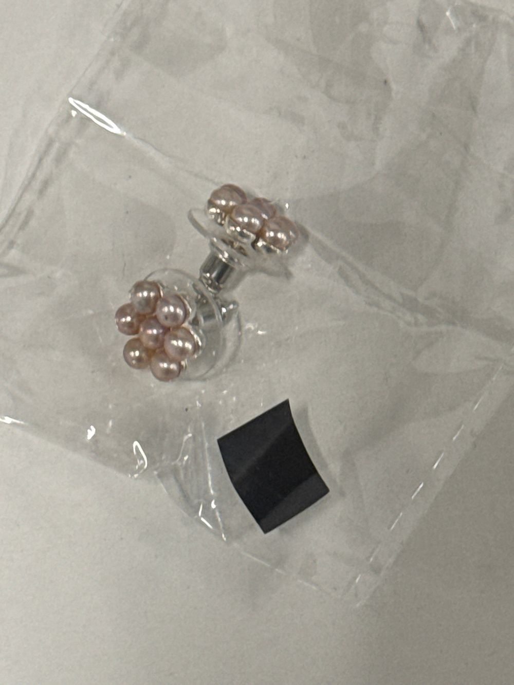 Lot 65: A Pair of Sterling Silver and Pink Pearl Cluster Stud Earrings