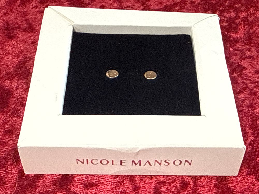 Lot 79: A pair of Nicole Manson yellow metal stud earrings