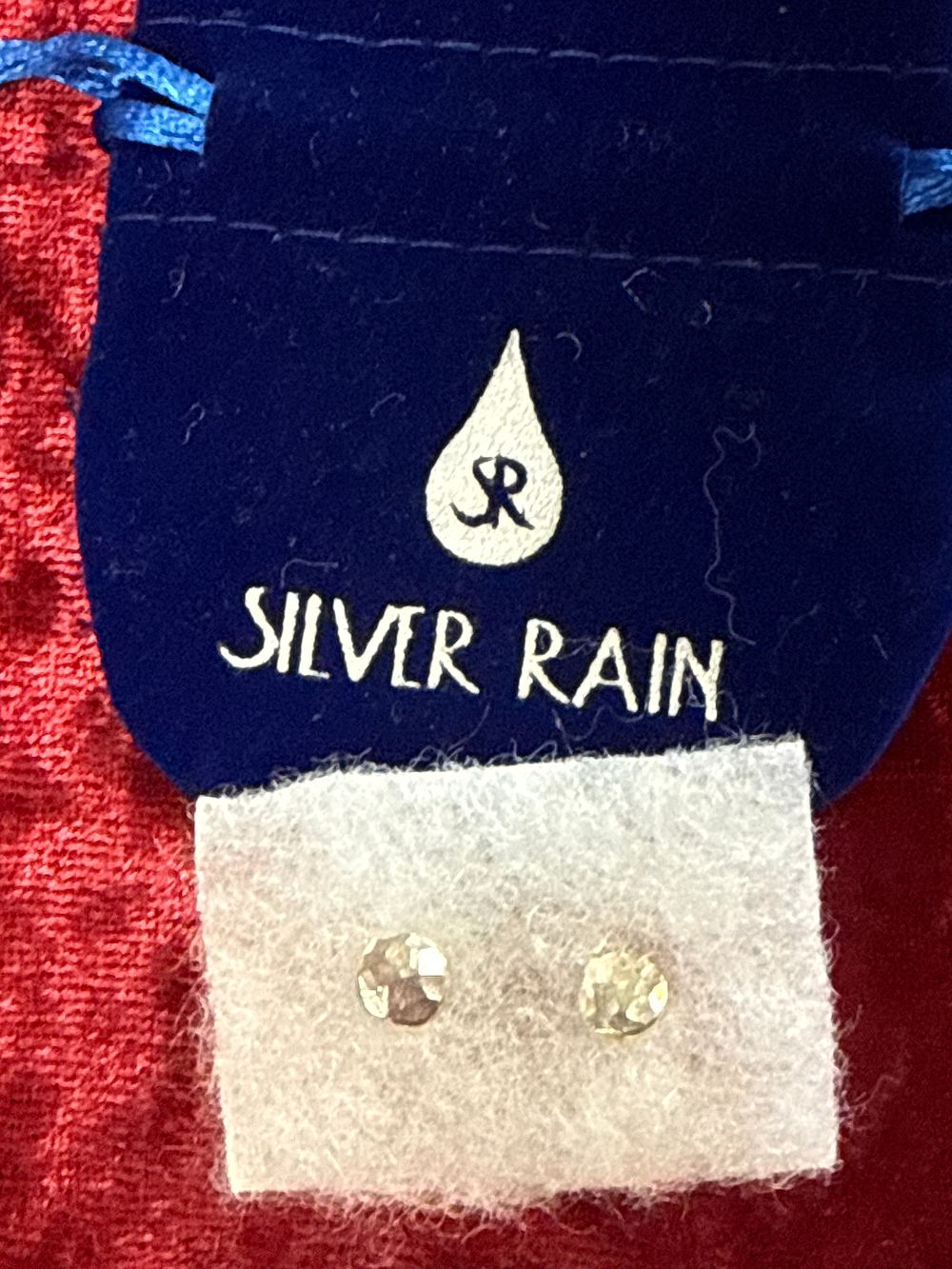 Lot 93: A Pair of Silver Rain Sterling Silver Stud Earrings