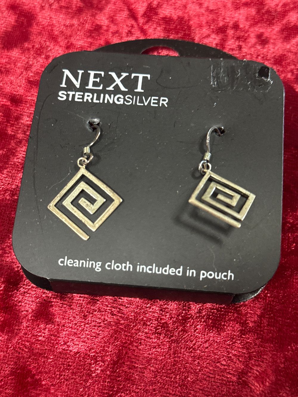Lot 97: A pair of Next sterling silver Greek key drop earrings