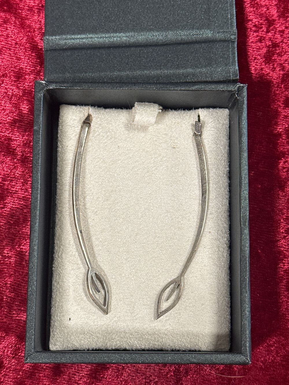 Lot 99: A Pair of Sterling Silver Modernist Leaf Drop Earrings