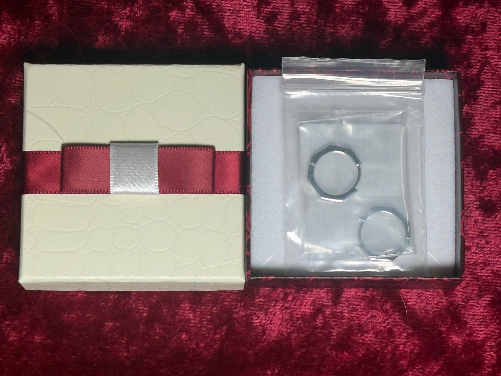 Lot 100: A Pair of Sterling Silver Octagonal Hoop Earrings