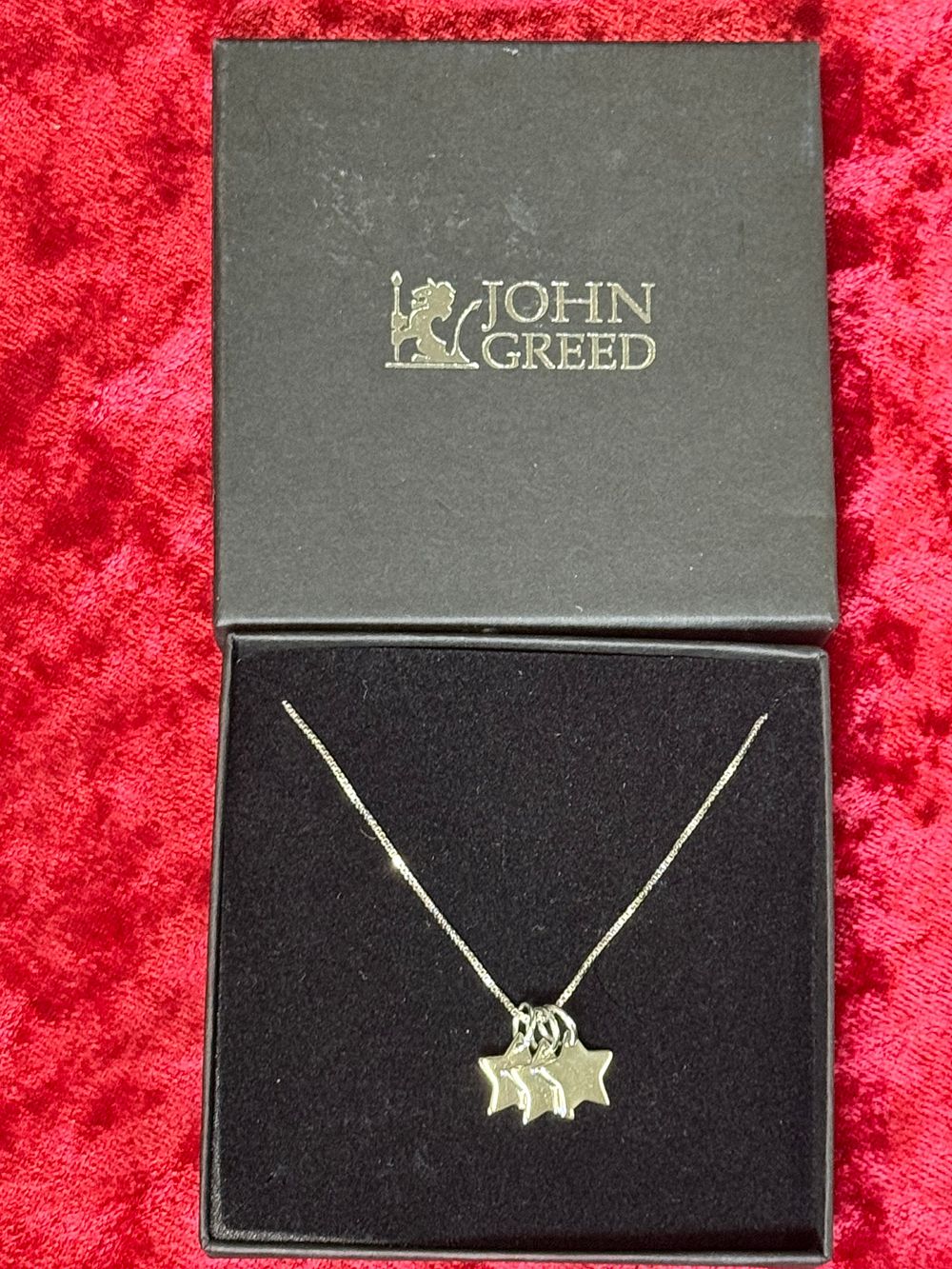 Lot 109: A Sterling Silver Triple Star Pendant Necklace by John Greed