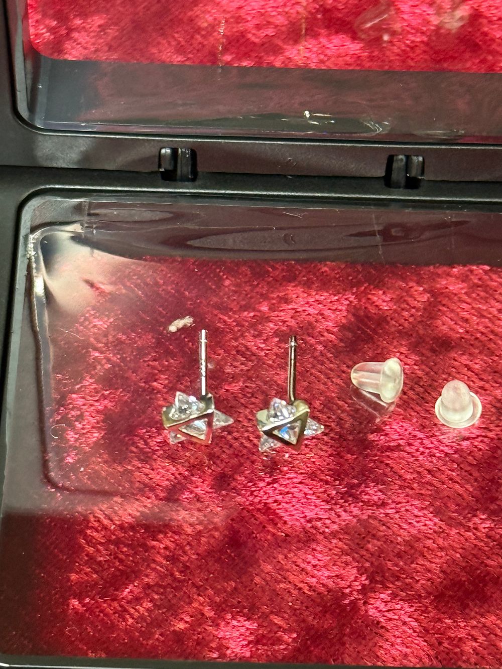 Lot 121: A Pair of Sterling Silver and Zircon Geometric Stud Earrings