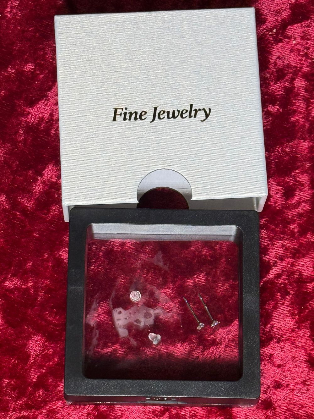 Lot 127: A pair of sterling silver stud jewellery earrings