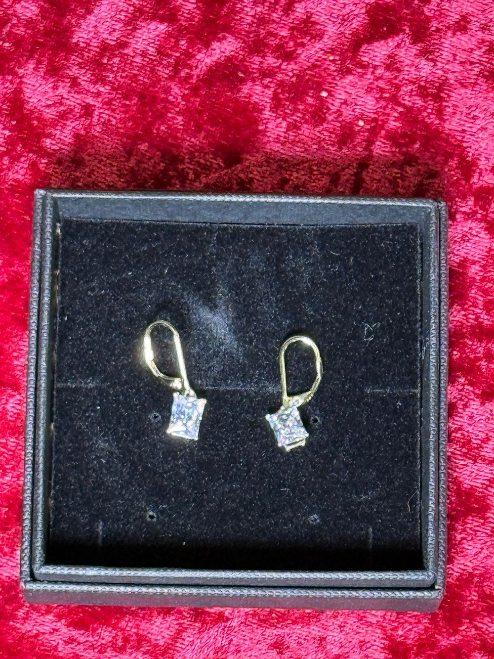 Lot 128: A Pair of Princess Cut Sterling Silver Drop Earrings