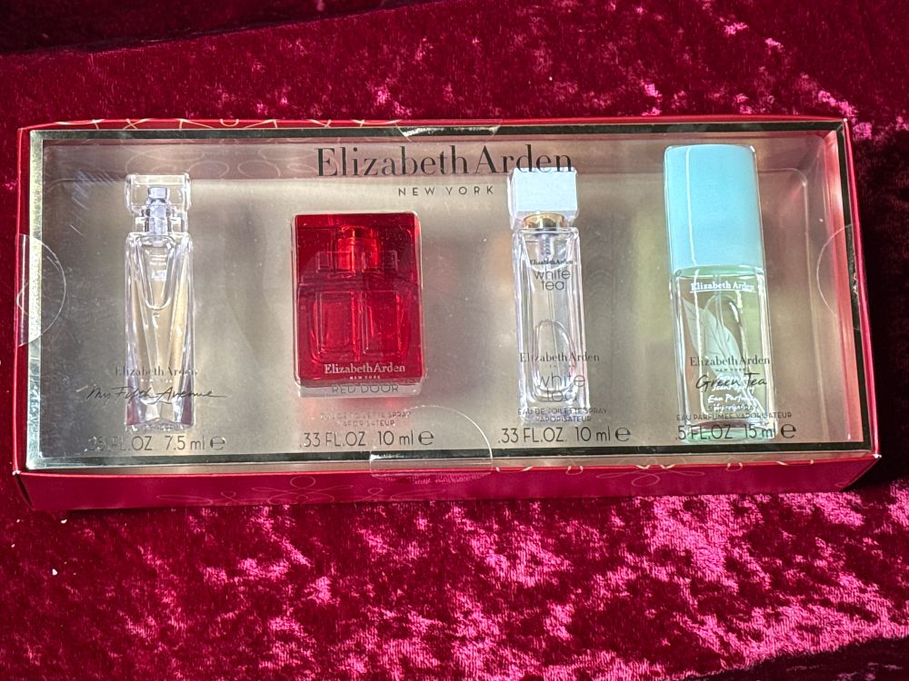 Lot 133: A group of Elizabeth Arden fragrance miniatures in presentation box
