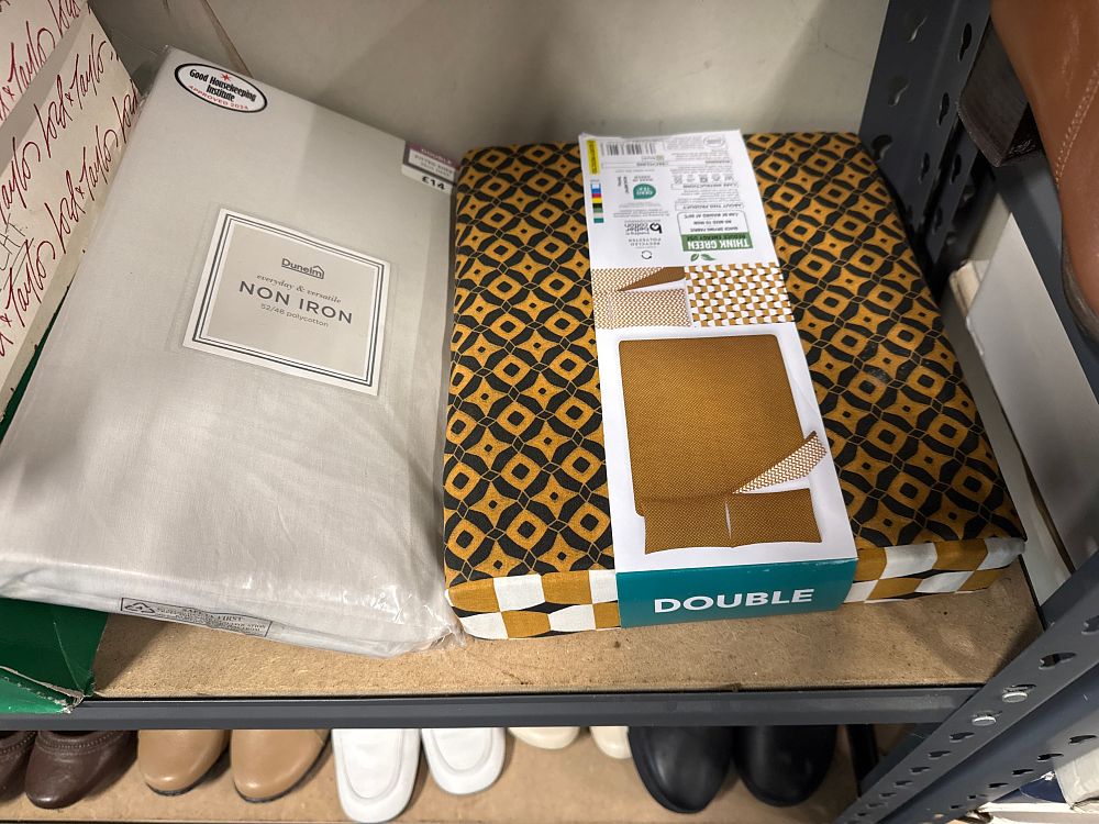 Lot 142: Two Dunelm non-iron bed sheet and duvet sets