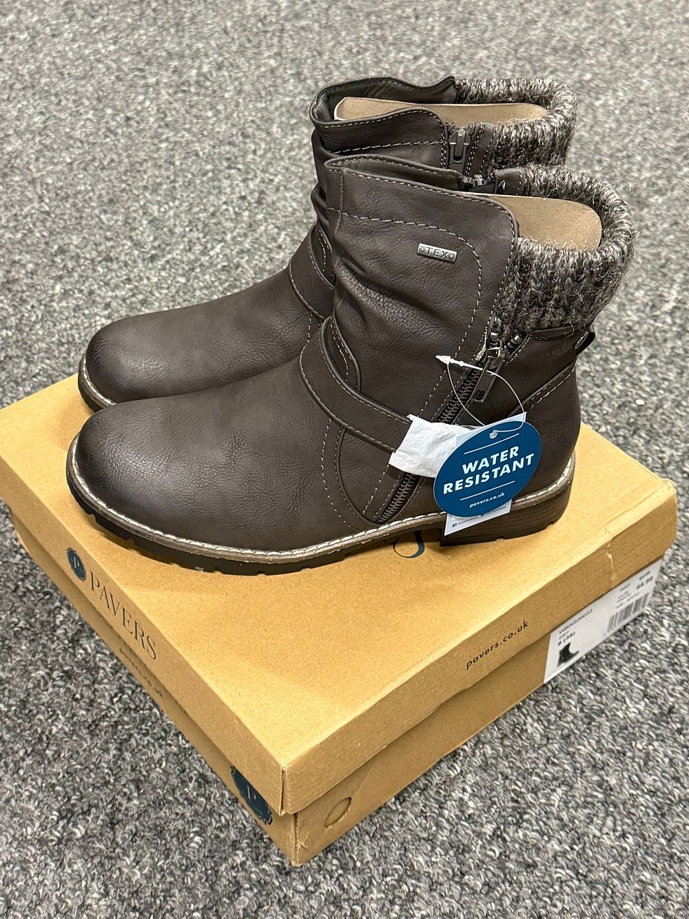 Lot 146: A pair of ladies' brown water-resistant ankle boots by Pavers