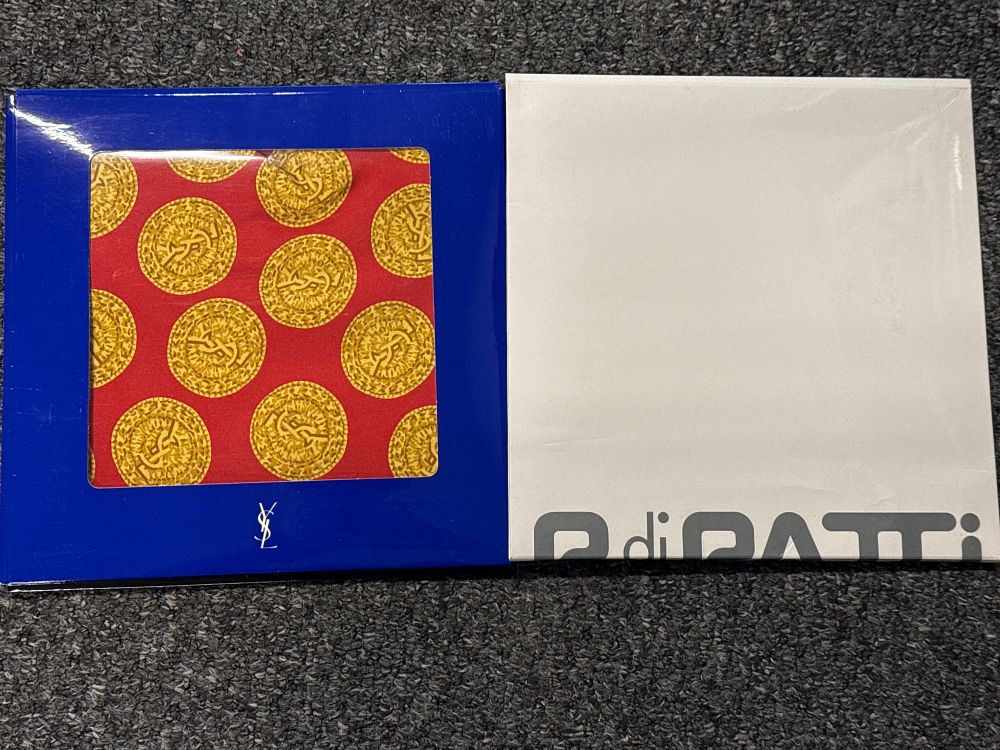 Lot 157: Two designer silk scarves by Yves Saint Laurent and D. di Patti