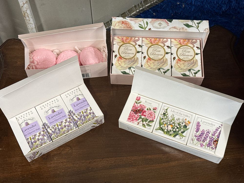 Lot 163: An assortment of floral scented decorative soaps in presentation boxes