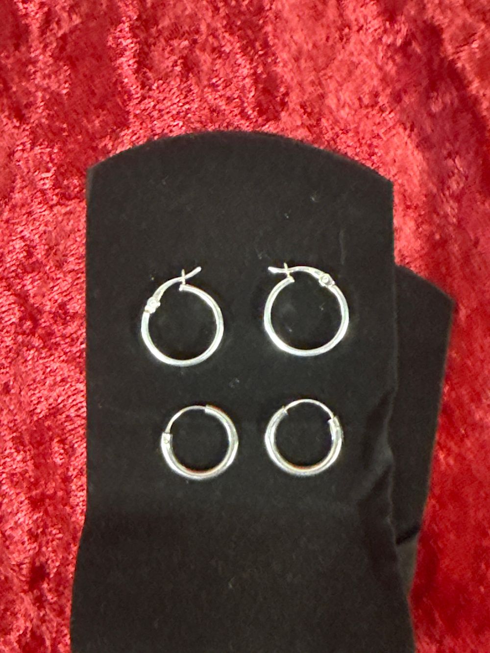 Lot 205: A Group of Small Sterling Silver Hoop Earrings