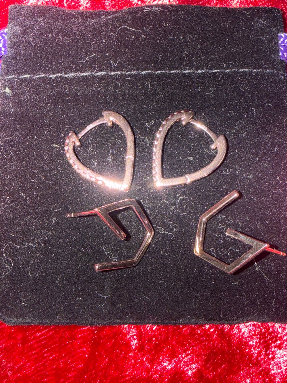 Lot 206: Two pairs of sterling silver rose-toned hoop earrings