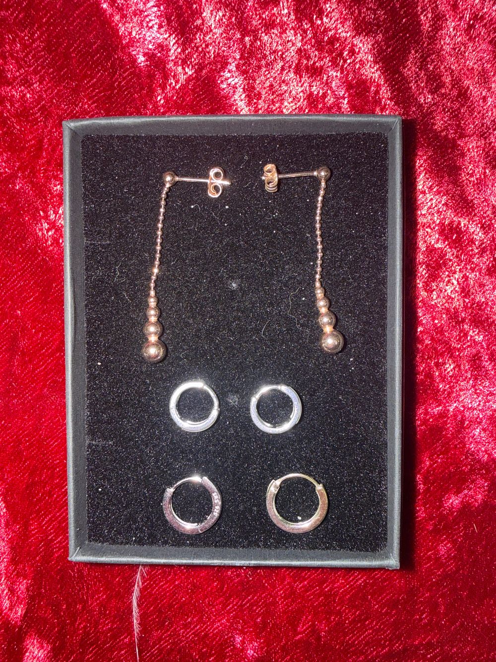 Lot 210: A Collection of Rose Gold and Sterling Silver Earrings