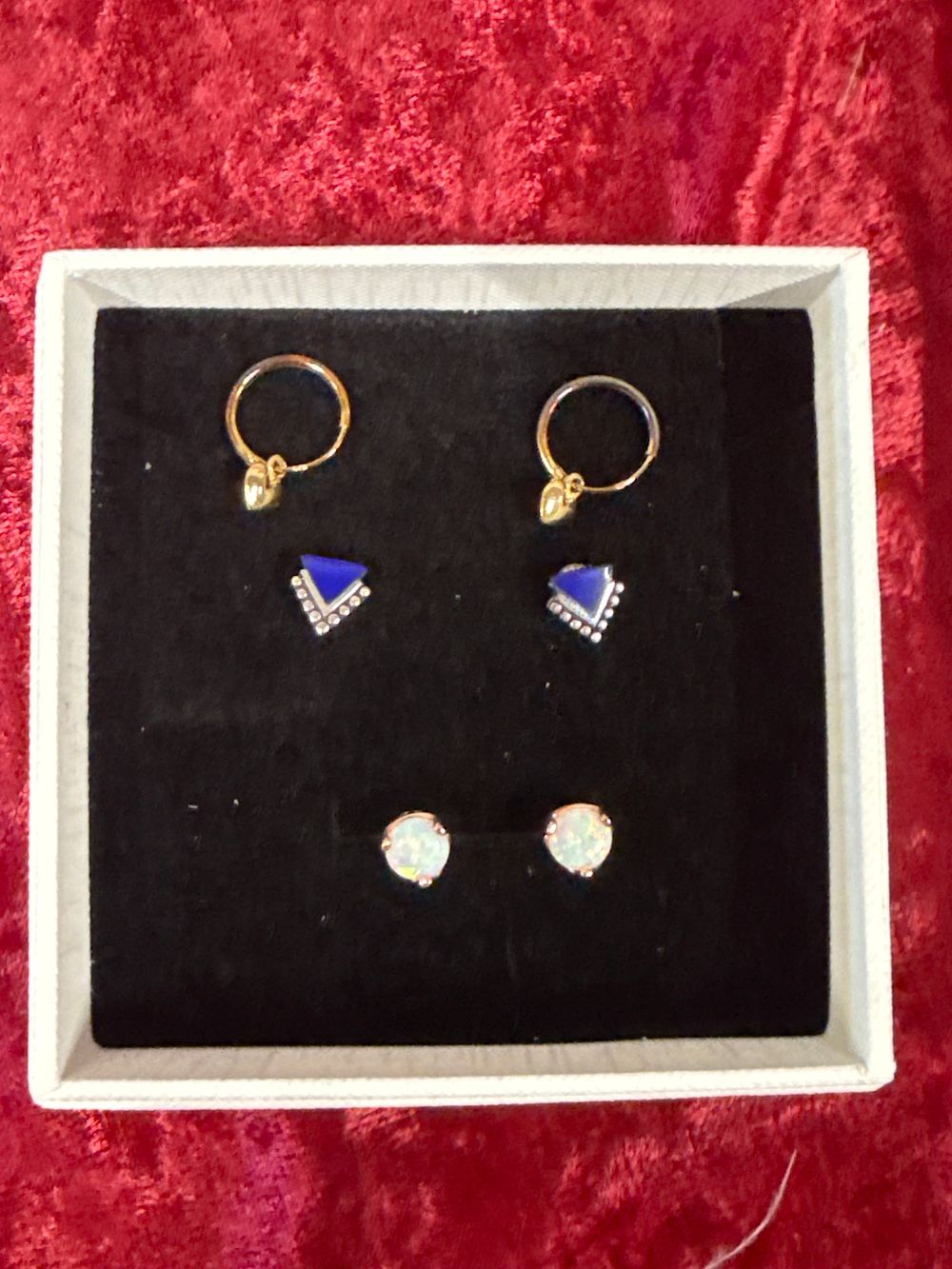 Lot 211: An assortment of three pairs of sterling silver earrings