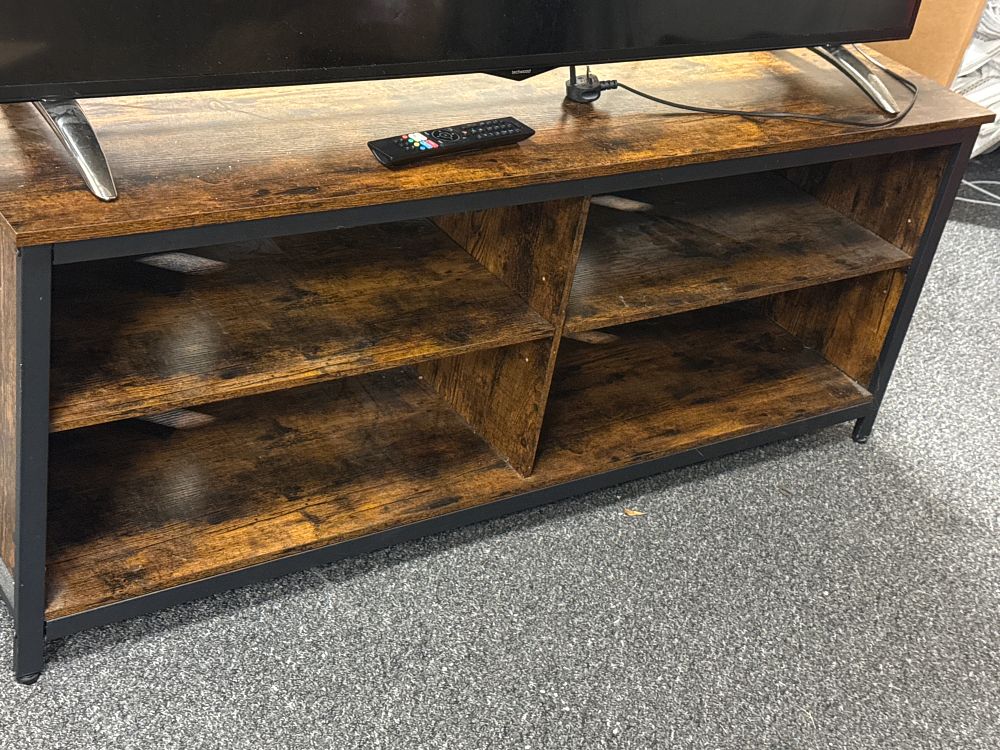 Lot 223: An industrial style tiered media unit with wood effect shelves