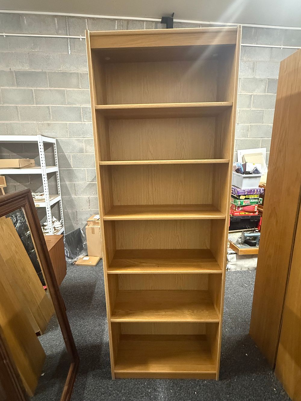 Lot 241: Contemporary full height light oak veneer open bookcase