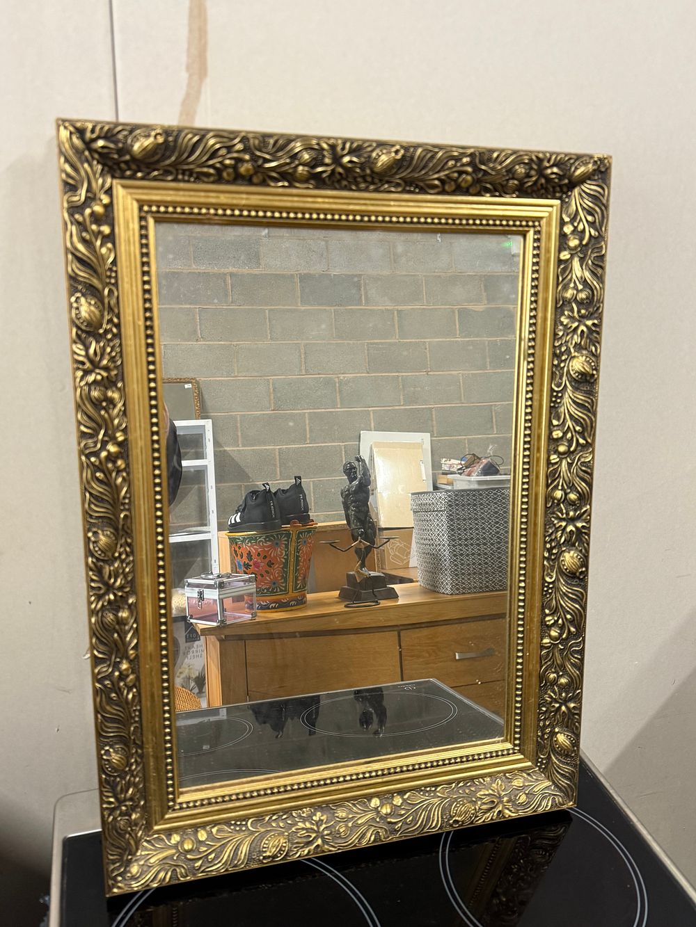 Lot 247: Ornate gold-toned rectangular wall mirror in Baroque style