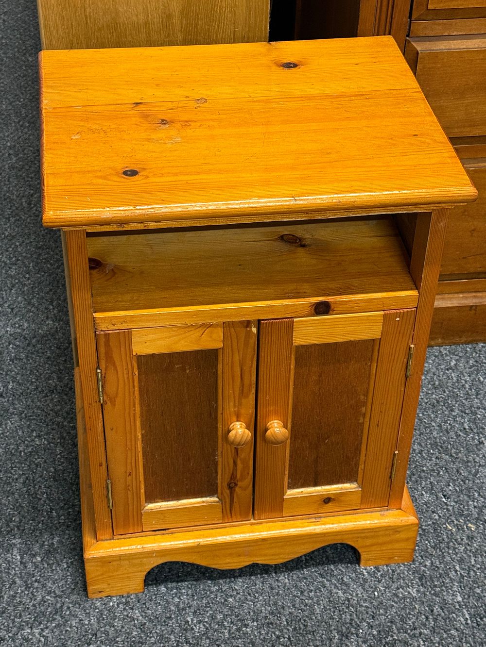 Lot 251: A rustic solid pine swinging storage cabinet component