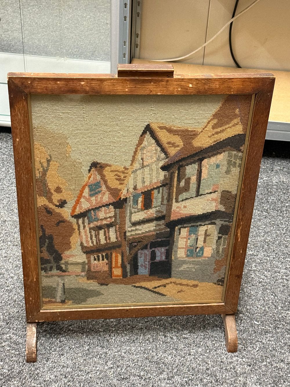 Lot 253: Vintage Wood Framed Needlepoint Tapestry Featuring a Tudor Village Scene