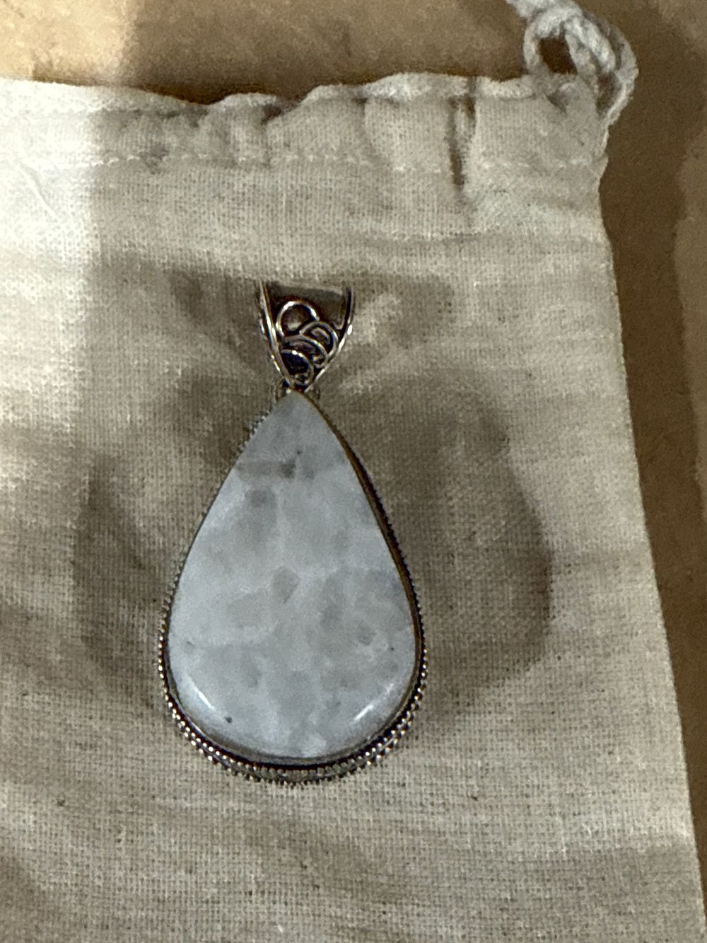 Lot 263: A large sterling silver and moonstone teardrop pendant