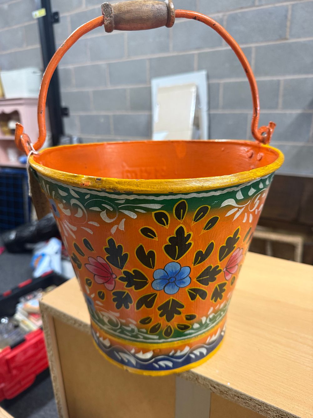 Lot 278: A hand-painted Barge Ware metal flower bucket with floral motifs