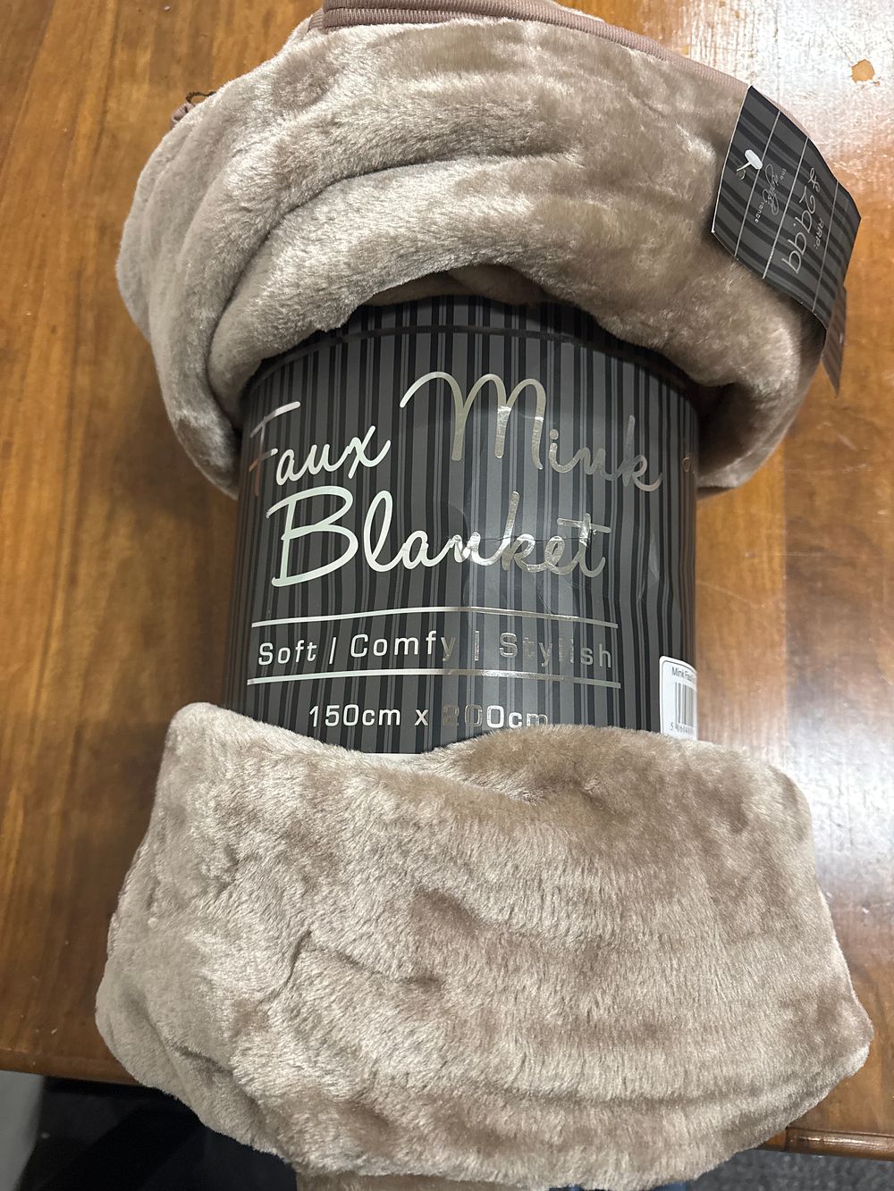 Lot 284: A large taupe plush faux mink throw blanket