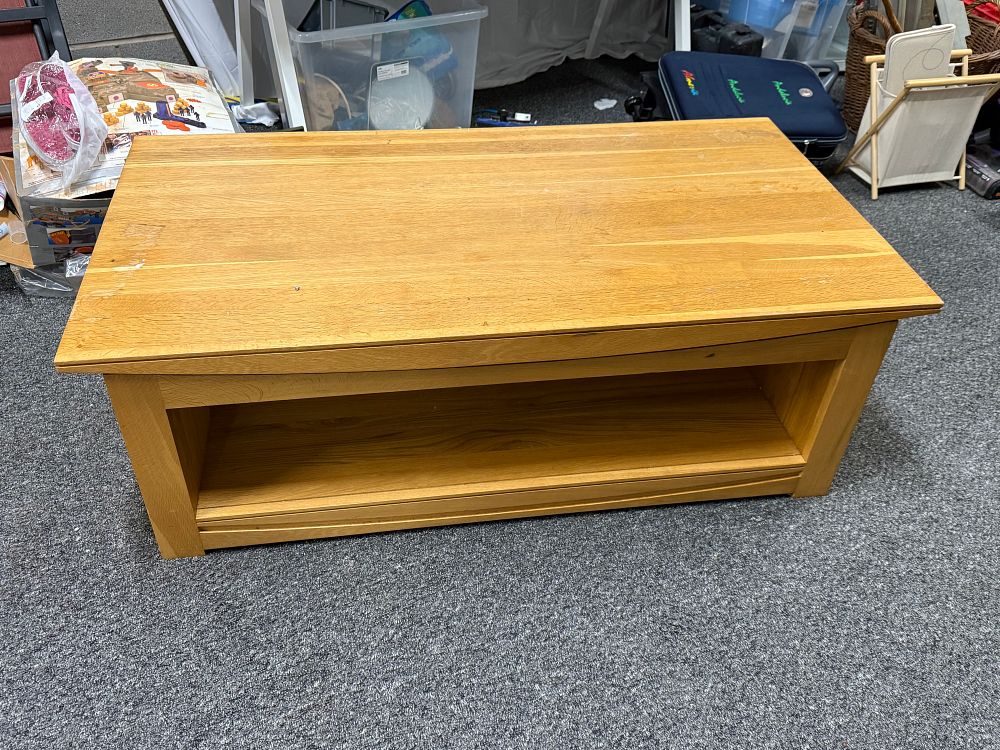 Lot 299: Contemporary oak coffee table with open storage shelf