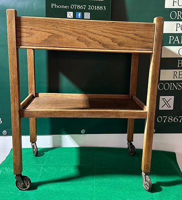Mid-Century Style Oak Two-Tier Serving Cart. A Mid-Century style two-tier serving cart 