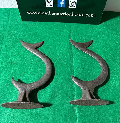 A Pair of Antique Cast Iron S-Scroll Supports. A pair of matching, S-curved objects crafted from 