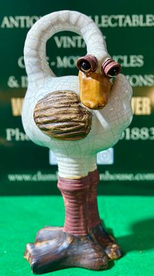 A Mid-Size Handmade Ceramic Artistic Super Fast Running Bird Ostrich Figure. This whimsical 