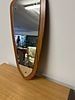 A Mid-Century Modern Asymmetrical Wall Mirror, possibly Teak, circa 1960s. A Mid-Century Modern Image - 1