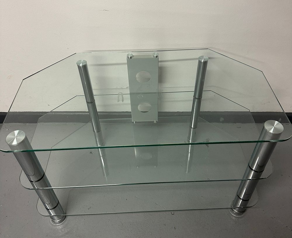 A Contemporary Three-Tier Glass and Metal Corner TV Stand. A contemporary three-tier media or 