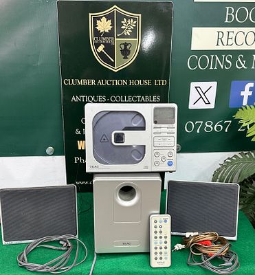 A TEAC MC-DX10 Micro Hi-Fi System with Remote and Speakers. A TEAC MC-DX10 Micro Hi-Fi System 
