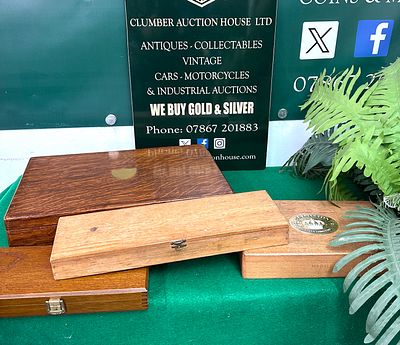 A Collection of Four Assorted Wooden Boxes. A collection of four wooden boxes of varying sizes 