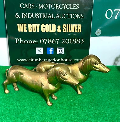 A Pair of Vintage Brass Dachshund Dog Figurines. A pair of vintage brass figural statuettes 