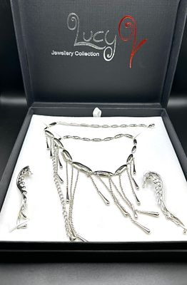 A Three-Piece Lucy Quartermaine Silver-Tone Jewellery Set. A three-piece jewellery set by Lucy 