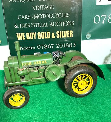 Replica John Deere 1931 GP Pressed Steel Metal Tractor Model. A replica John Deere 1931 GP 