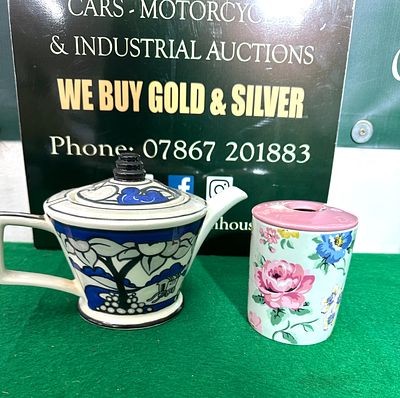 A Pair of Ceramic Vessels: A Blue and White Teapot and a Cath Kidston Container. A pair of 