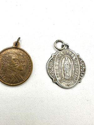 A Vintage Catholic Miraculous Mary Promoter Silver Tone Medal and a Bronze Commemorative Medal. A 