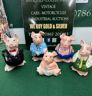 A Set of Five Wade NatWest Piggy Bank Family Figurines. A set of five Wade NatWest ceramic piggy 