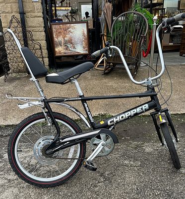 A Black Raleigh Chopper Mk III Bicycle. A Raleigh Chopper Mk III bicycle, featuring 'ape-hanger' 