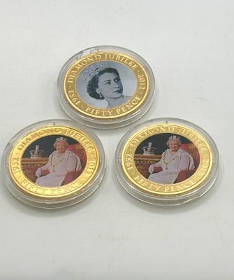 A Trio of Bailiwick of Jersey Queen Elizabeth II Diamond Jubilee Gold-Plated Fifty Pence Coins. A 