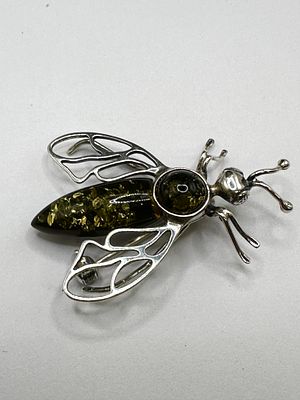 A Baltic Amber and 925 Silver Insect Brooch. A brooch in the form of an insect, featuring two 