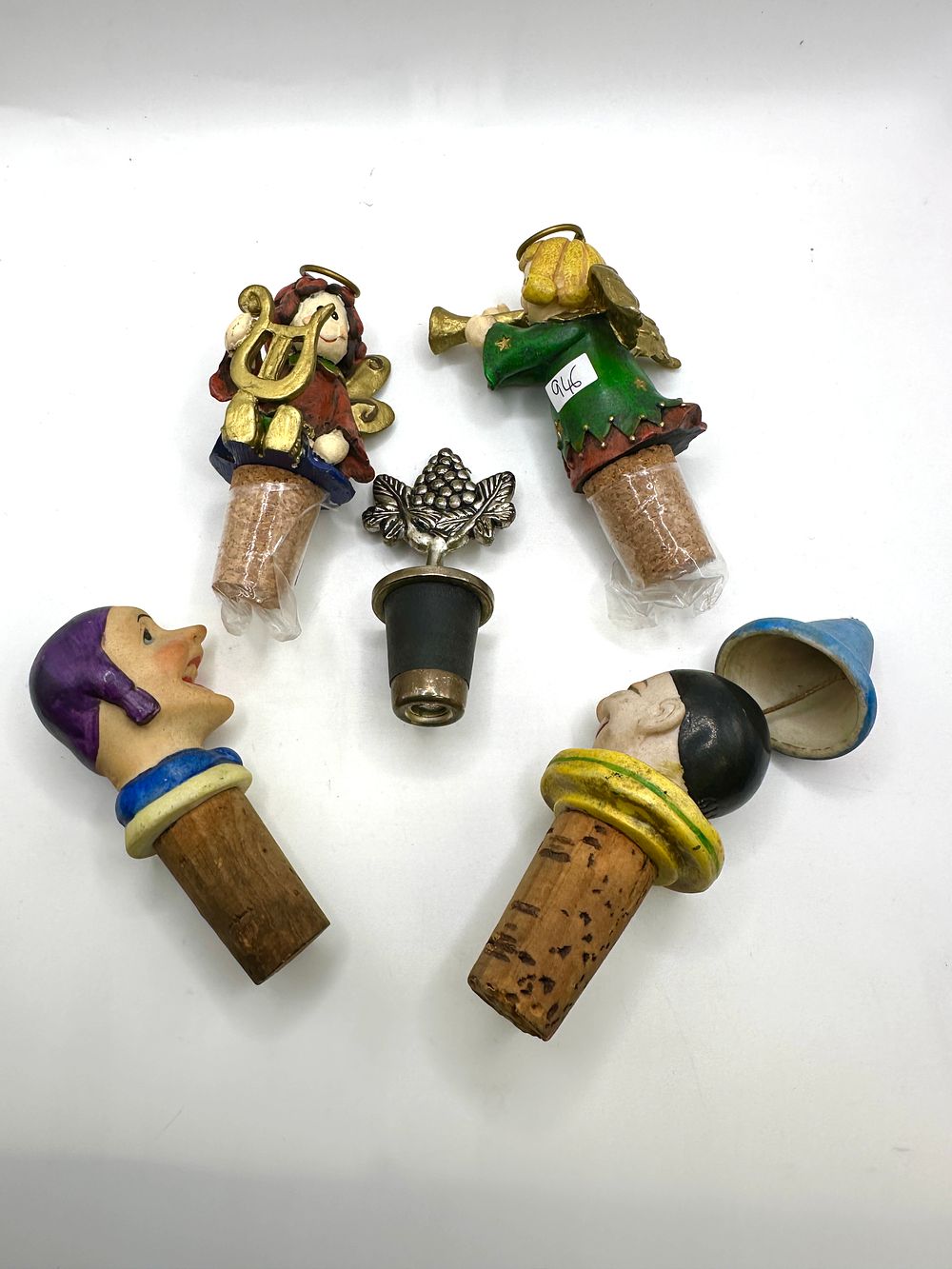 An Assortment of Vintage and Decorative Bottle Stoppers. An assortment of decorative wine bottle 
