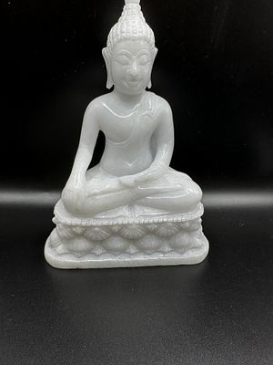 A Burmese Blue Marble Seated Buddha Statue. A Burmese blue marble statue of a seated Buddha in 