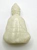 A Carved White Jade Figure of a Seated Buddha. A carved white marble figure of a seated Buddha Image - 1