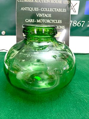 A Vintage Sunsweet Prune Juice Emerald Green Glass Bottle. A vintage emerald green glass bottle 